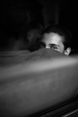 An intimate moment of an acting coach guiding a student through Meisner technique.