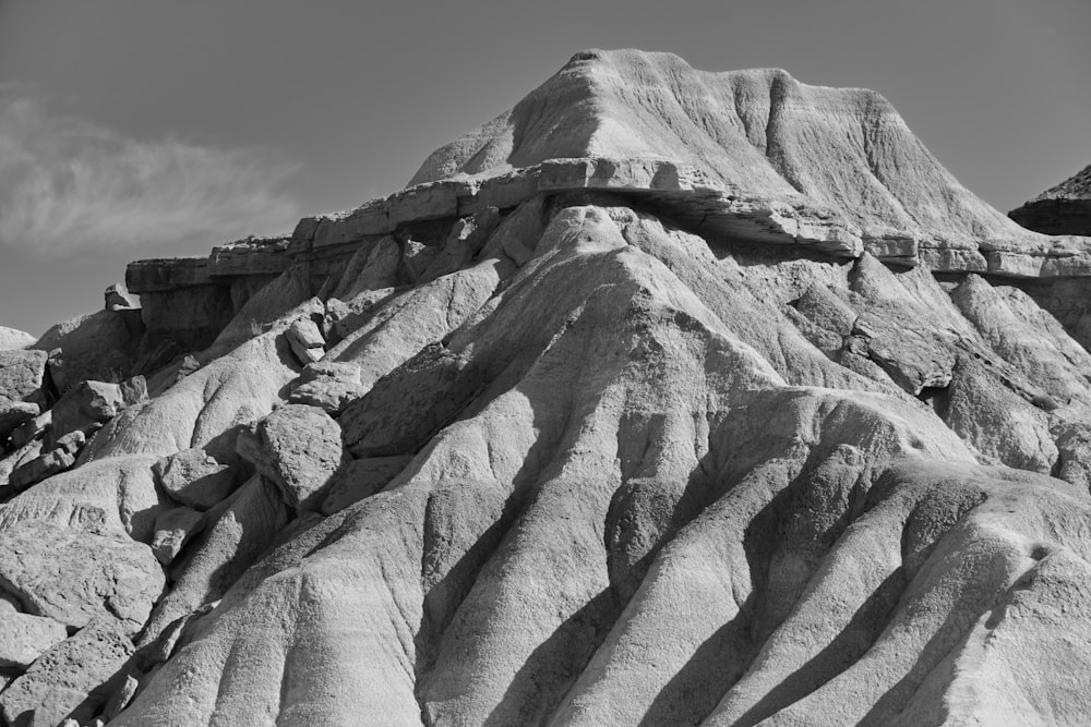 a black and white photo of a mountain