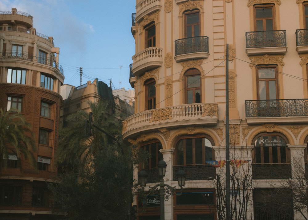 a tall building with balconies and balconies on the top of it