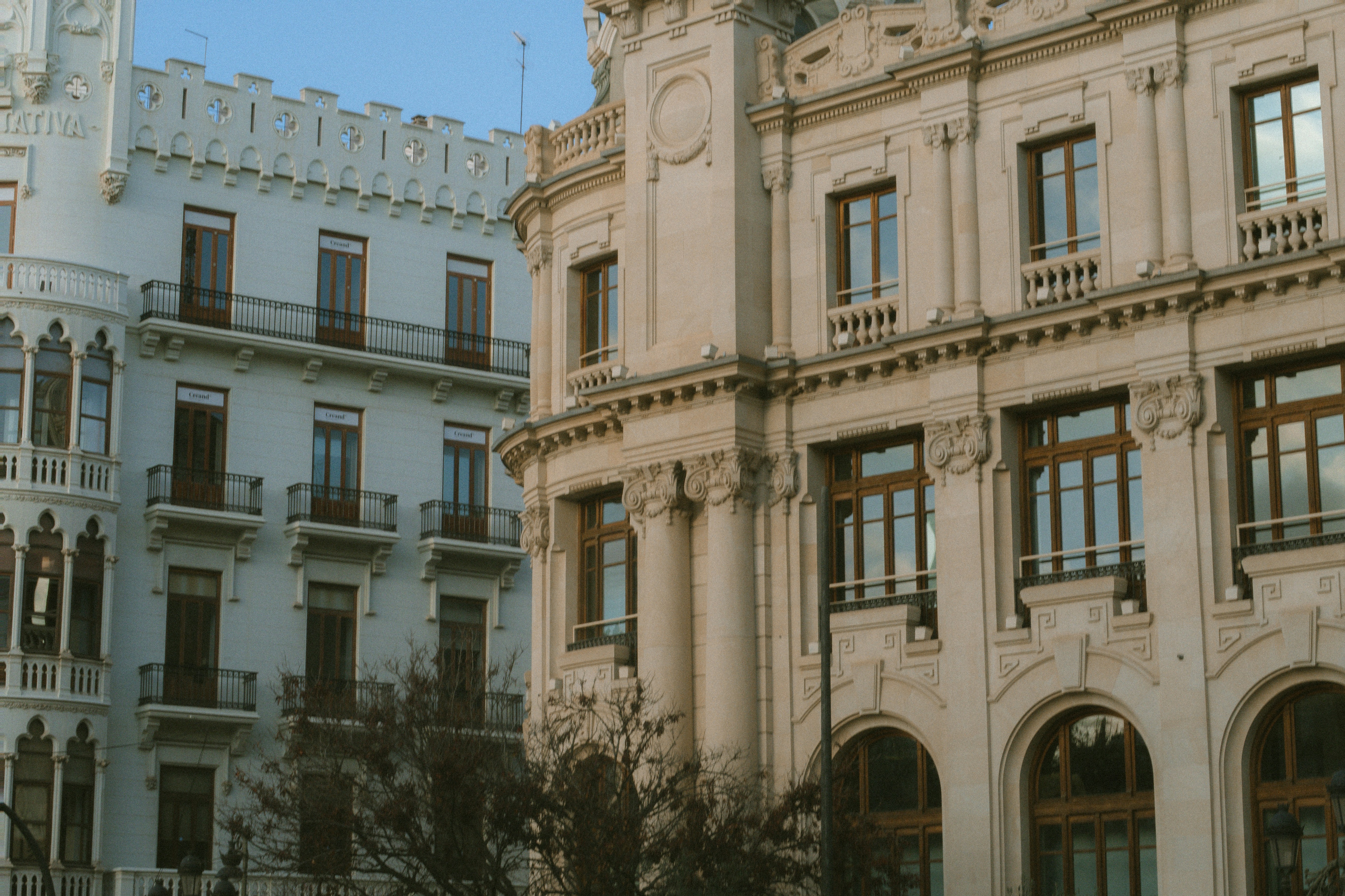 a building with a clock on the front of it, 