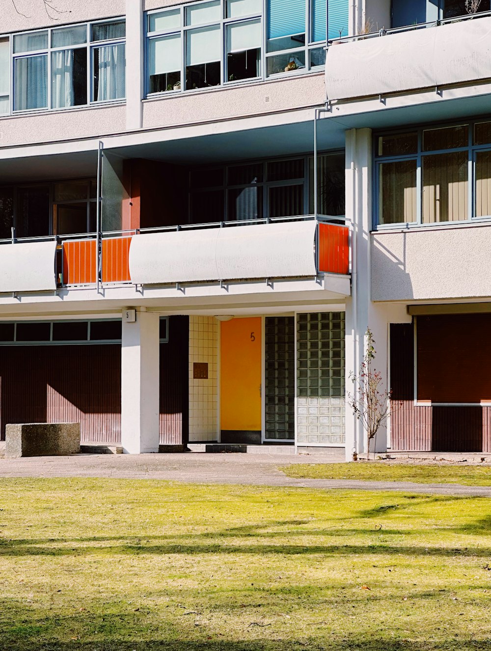 an apartment building with balconies and balconies on the balconies