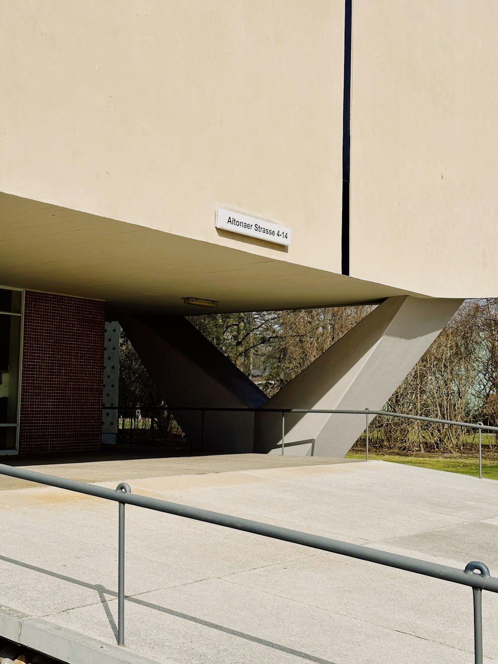 a large building with a metal fence around it