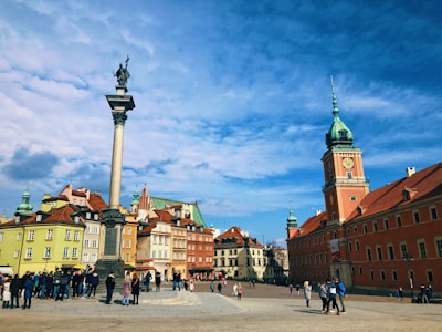 A peaceful town square where people of all ages gather, representing community spirit.