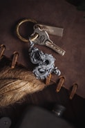 Close-up of careful craftsmanship details on a durable, handmade keychain with soft lighting.