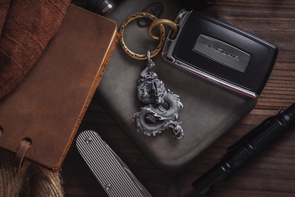 A collection of personalized gift items including keychains, notebooks, and phone cases.