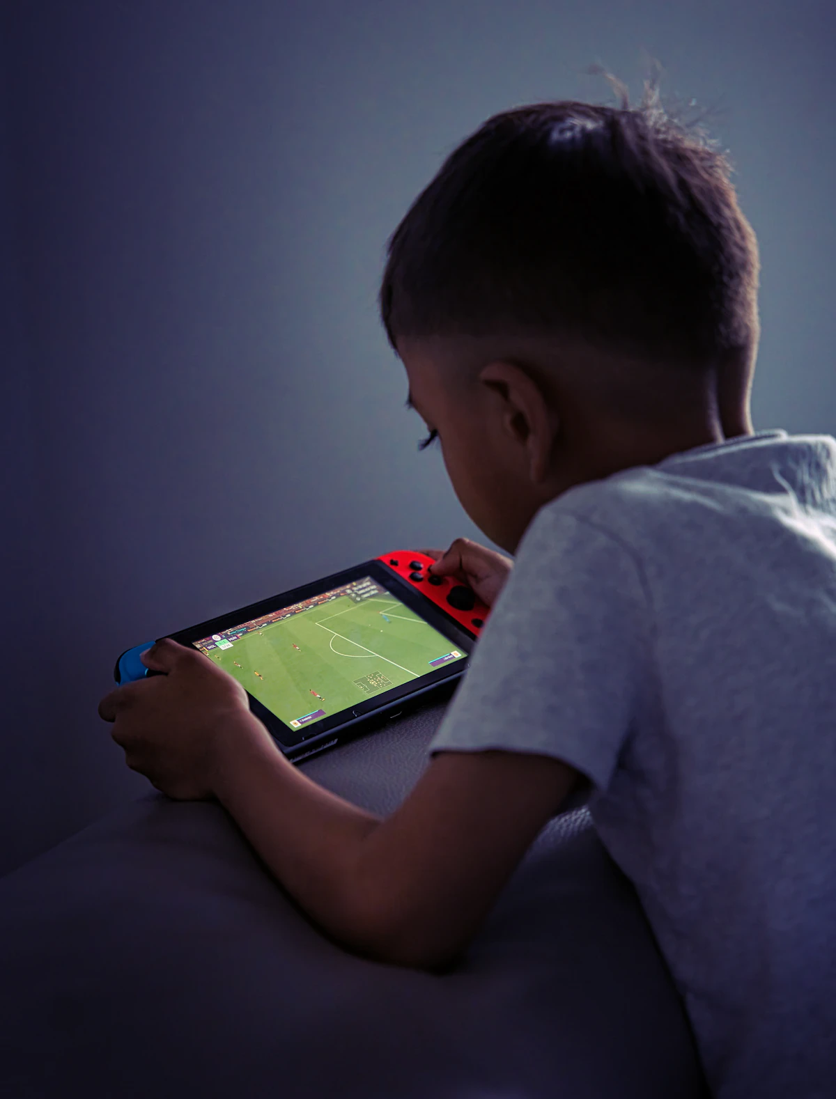 Parent and child reviewing device privacy settings together