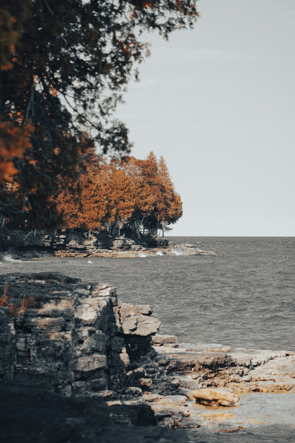 a lone boat in the middle of a body of water