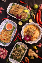 a table topped with plates filled with food