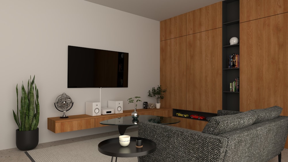 a modern living room with a large screen tv