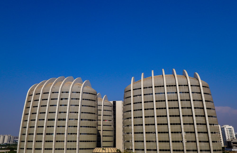 a couple of large buildings sitting next to each other