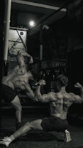 a couple of men standing next to each other