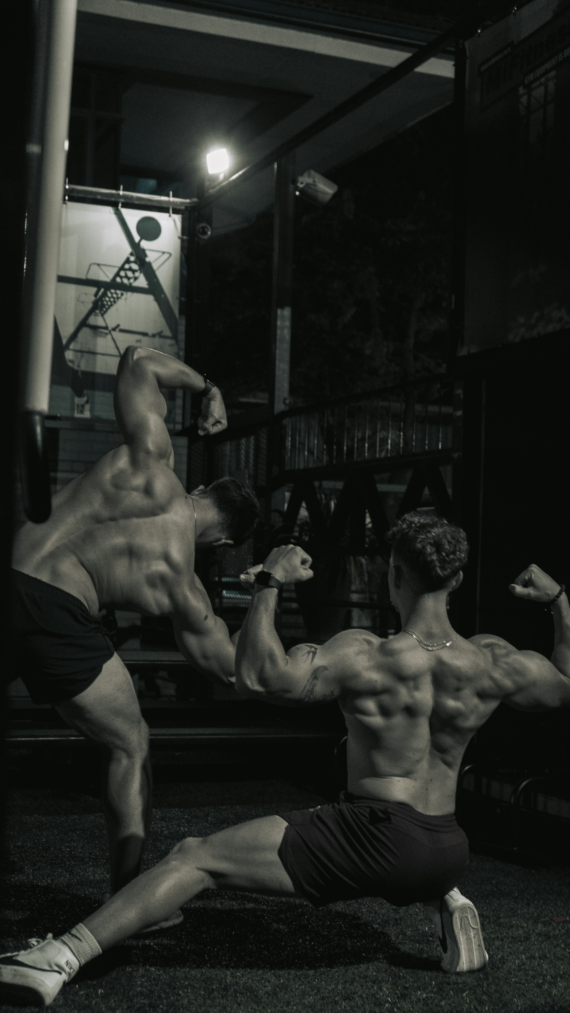 a couple of men standing next to each other