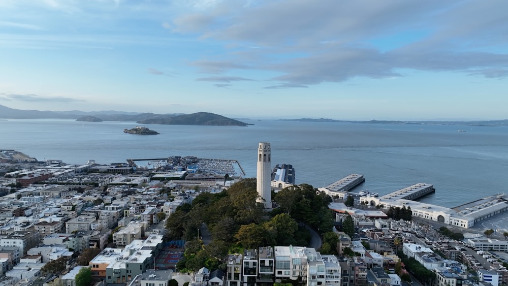 an aerial view of a city by the ocean