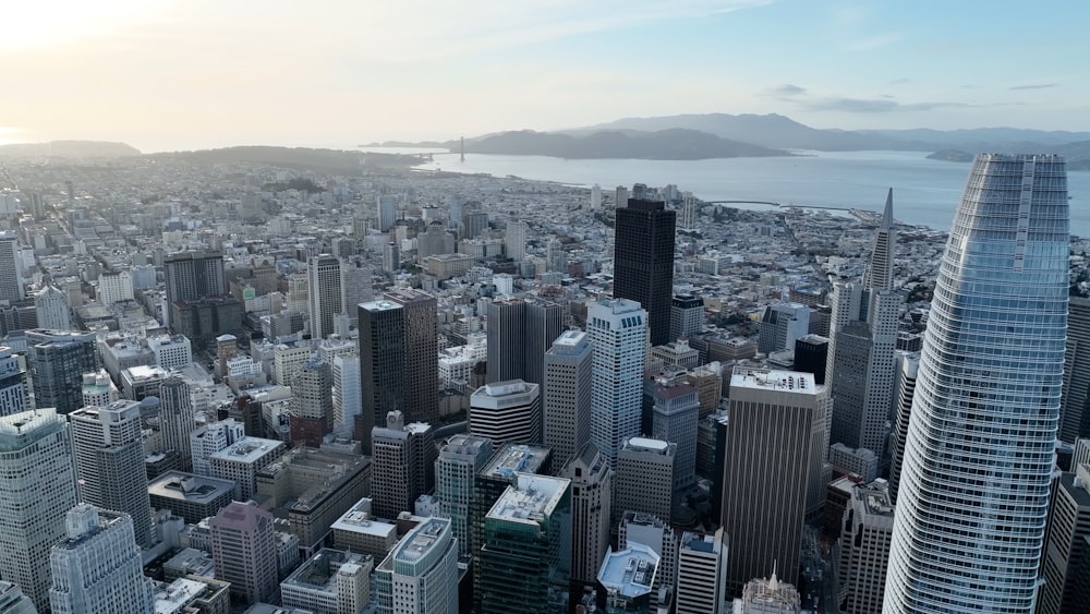 an aerial view of a city with tall buildings