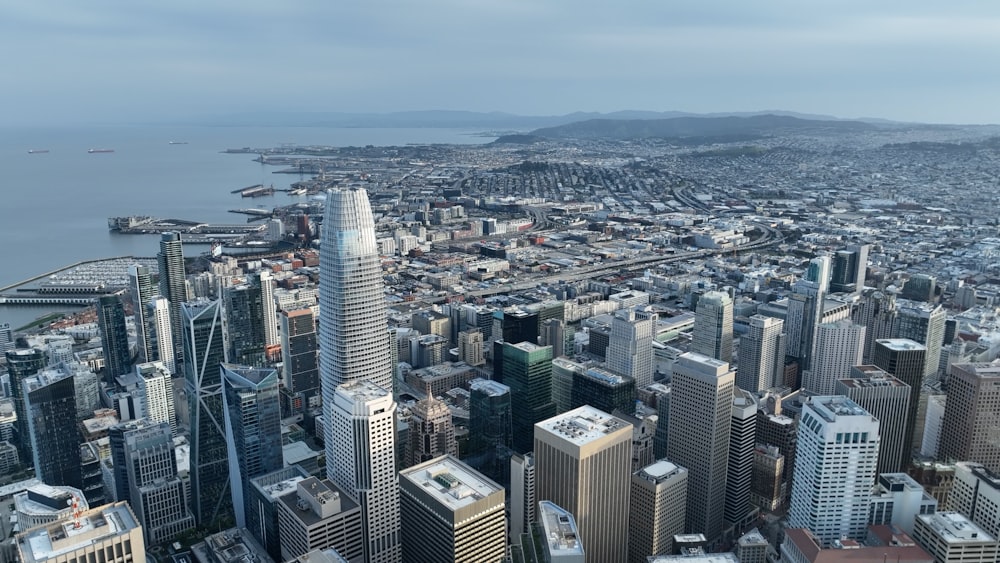 an aerial view of a city with tall buildings