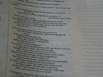 A close-up view of a page from a book, displaying text in a column format. The text appears to be religious in nature, mentioning salvation, Zion, and the Lord.