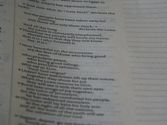 A close-up view of a page from a book, displaying text in a column format. The text appears to be religious in nature, mentioning salvation, Zion, and the Lord.