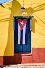 a blue and red door with a white star on it