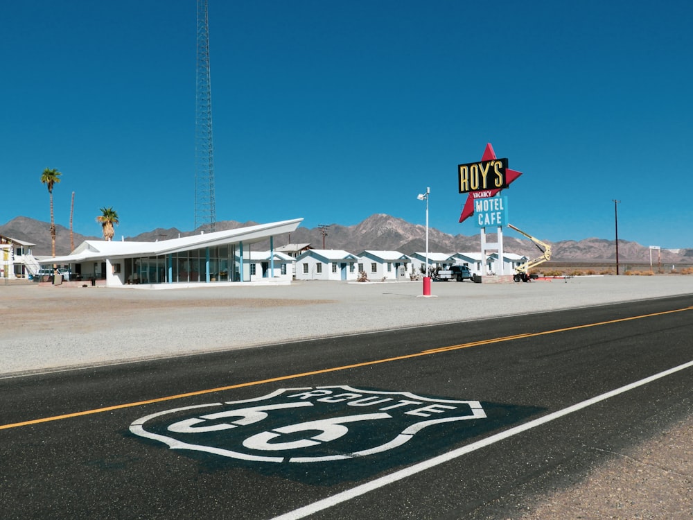 a route 66 sign on the side of a road