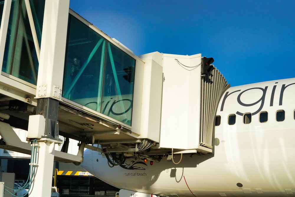 a large jetliner sitting on top of an airport tarmac