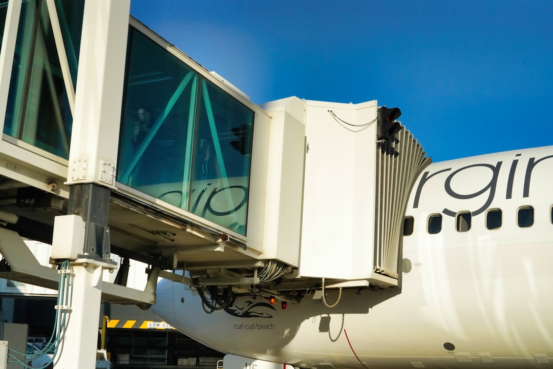 a large jetliner sitting on top of an airport tarmac,