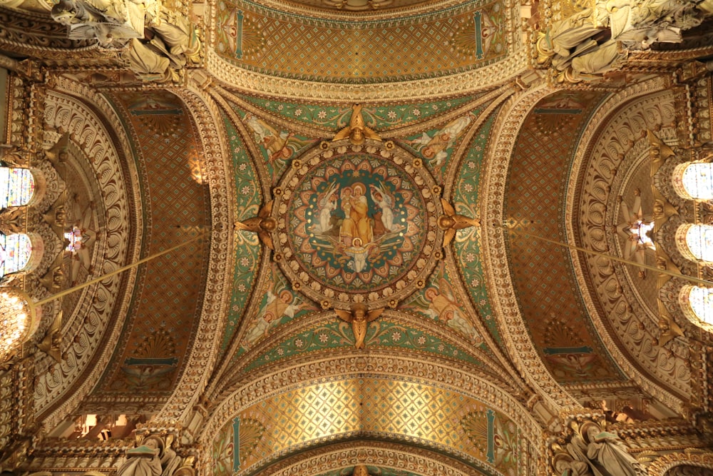 the ceiling of a church with a painting on it