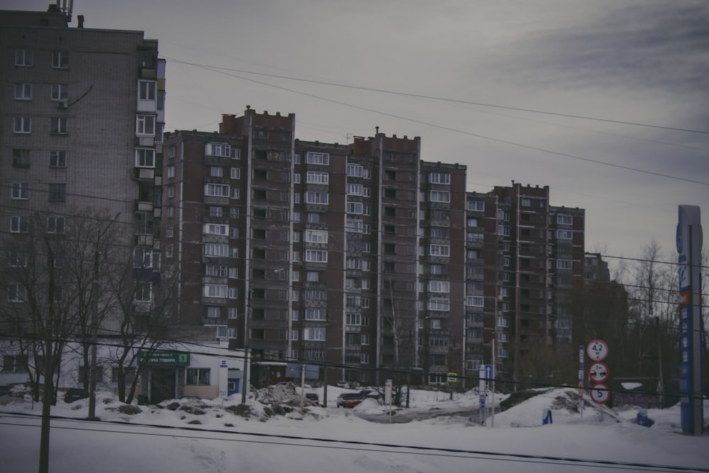 a train traveling through a snow covered city