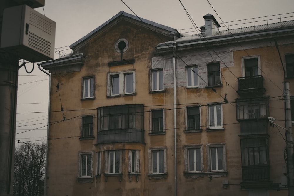 an old building with many windows and balconies