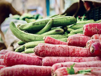 Close-up of fresh organic vegetables and fruits in a rural market setting.