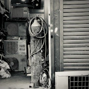 A modern showroom displaying various refrigeration and air conditioning brand logos on the wall.