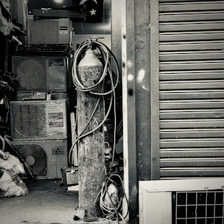 Technician setting up a portable AC unit at an outdoor event.