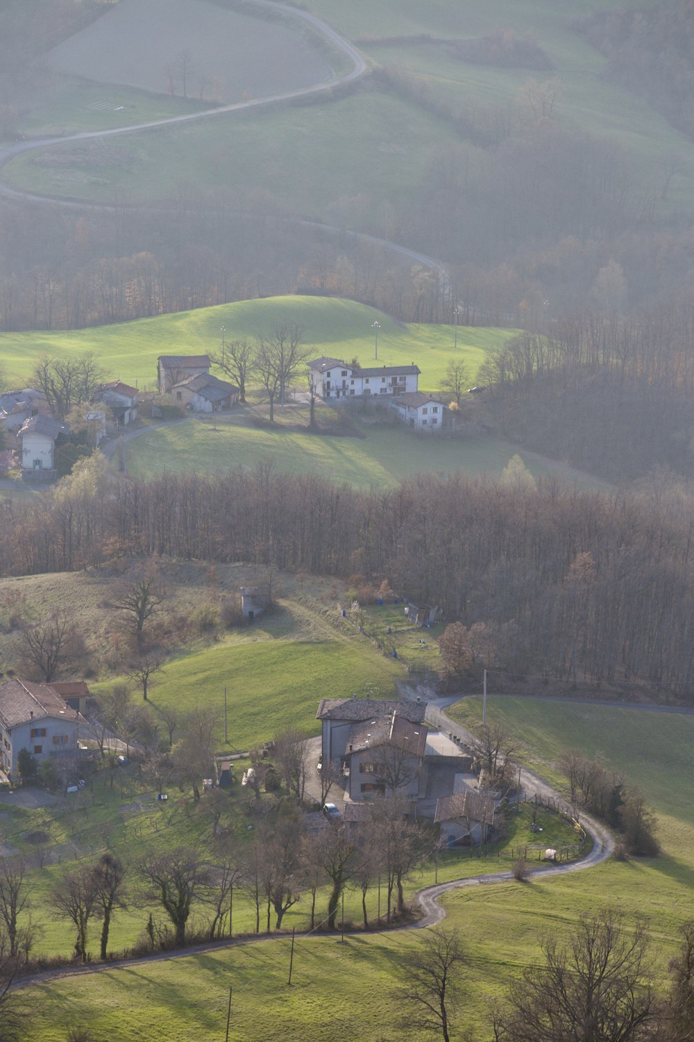 an aerial view of a rural area with houses