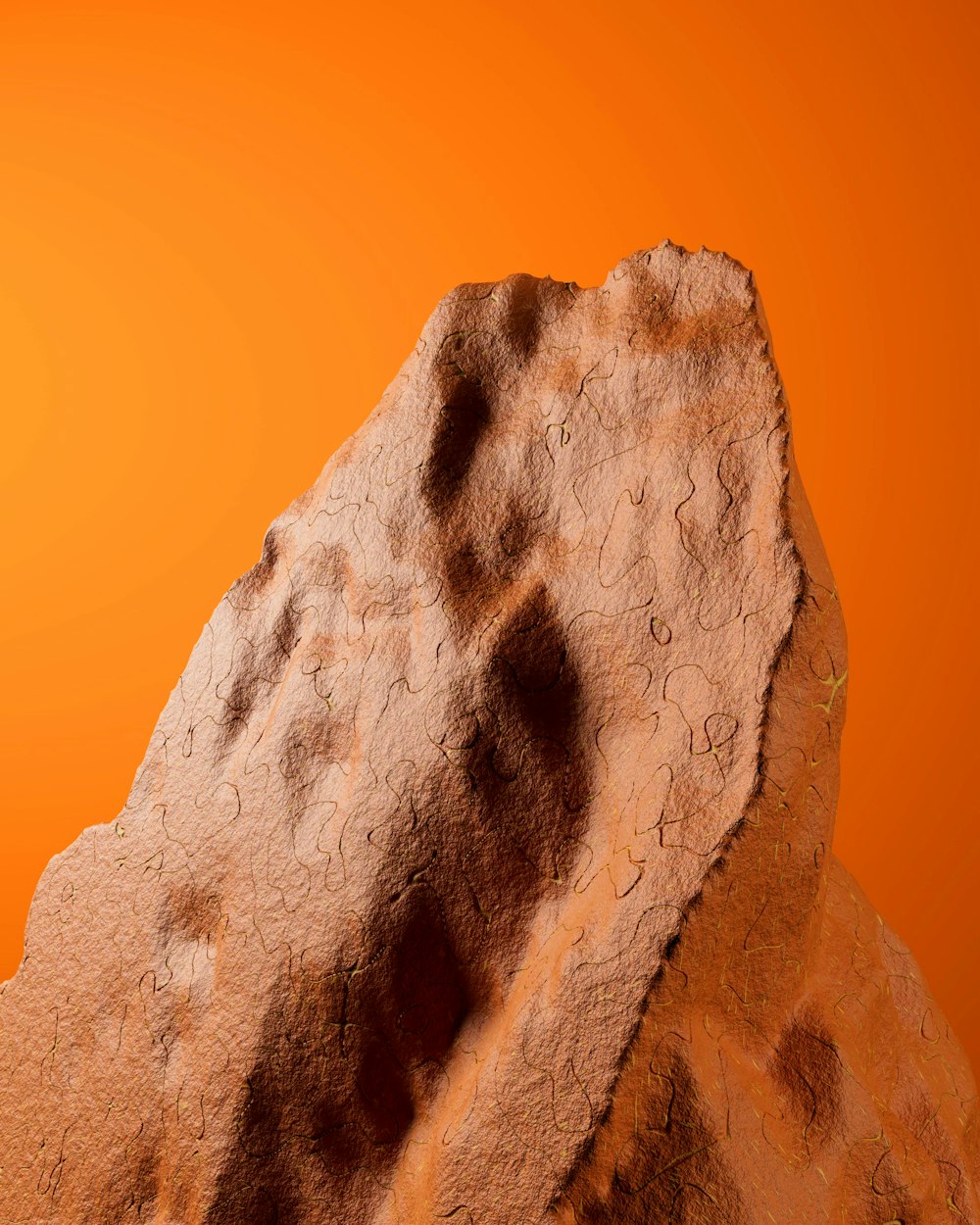 a close up of a giraffe's head with an orange background