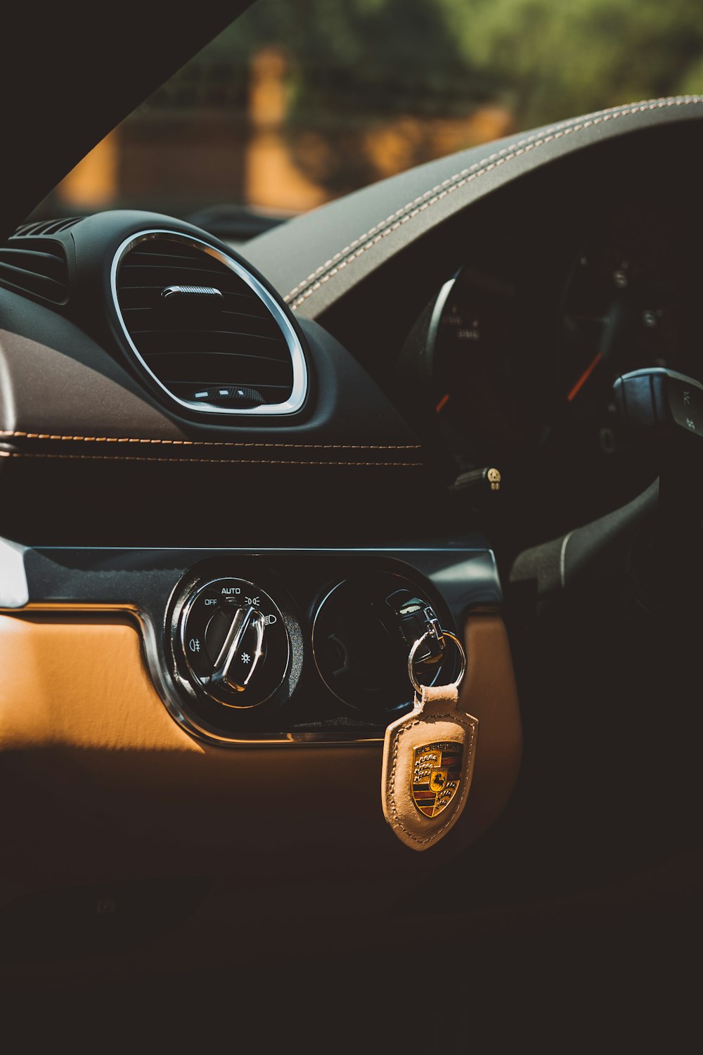 a close up of a steering wheel and dashboard of a car