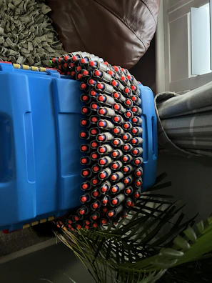 Accessories for foam dart blasters neatly arranged for viewing.