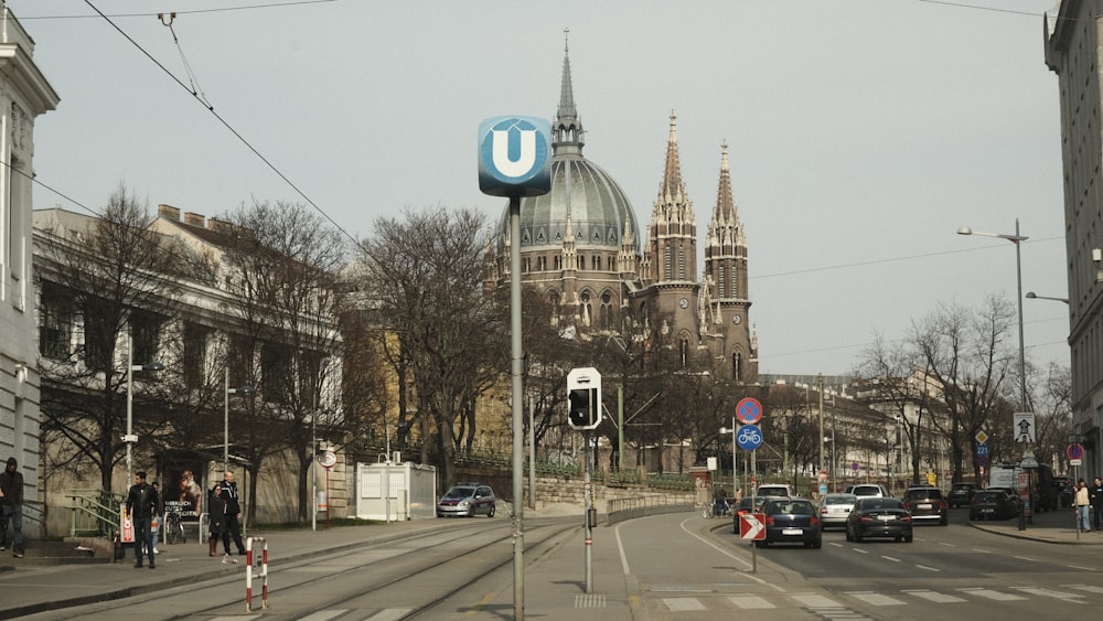 a city street with a church in the background