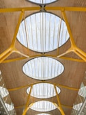 A bright and airy space with PVC ceiling and decor accents.