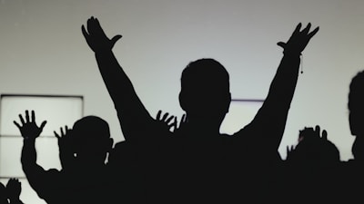 A group of multicolored silhouettes representing diverse investors and families.