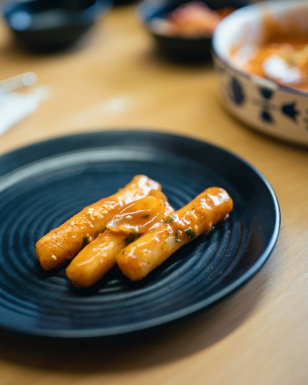 a plate of food on a wooden table