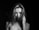 a black and white photo of a woman with long hair