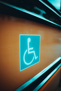 a handicap sign on the side of a bus