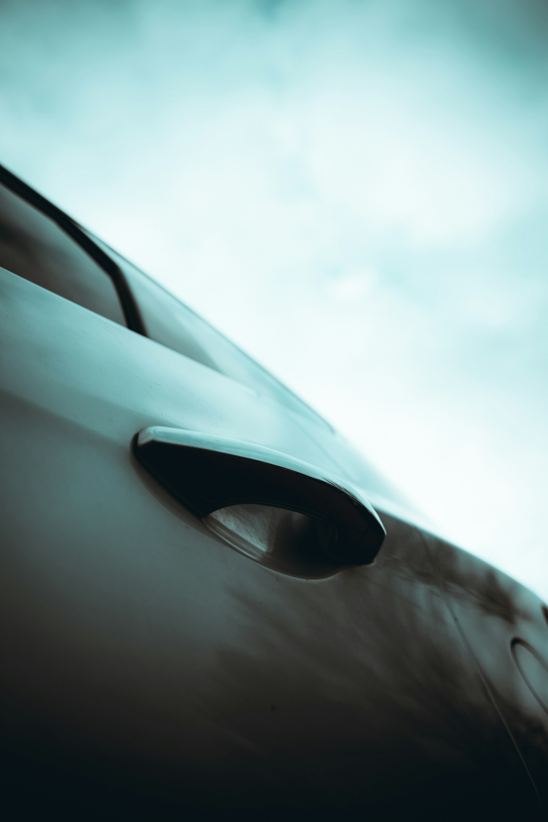 woman wearing yellow long-sleeved dress under white clouds and blue sky during daytime