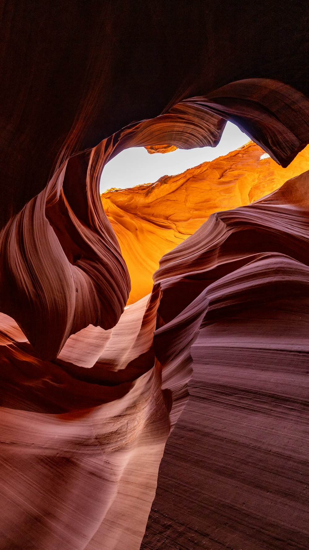 a narrow slot in the side of a canyon