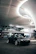 A sleek car parked safely in a modern, well-lit parking facility.