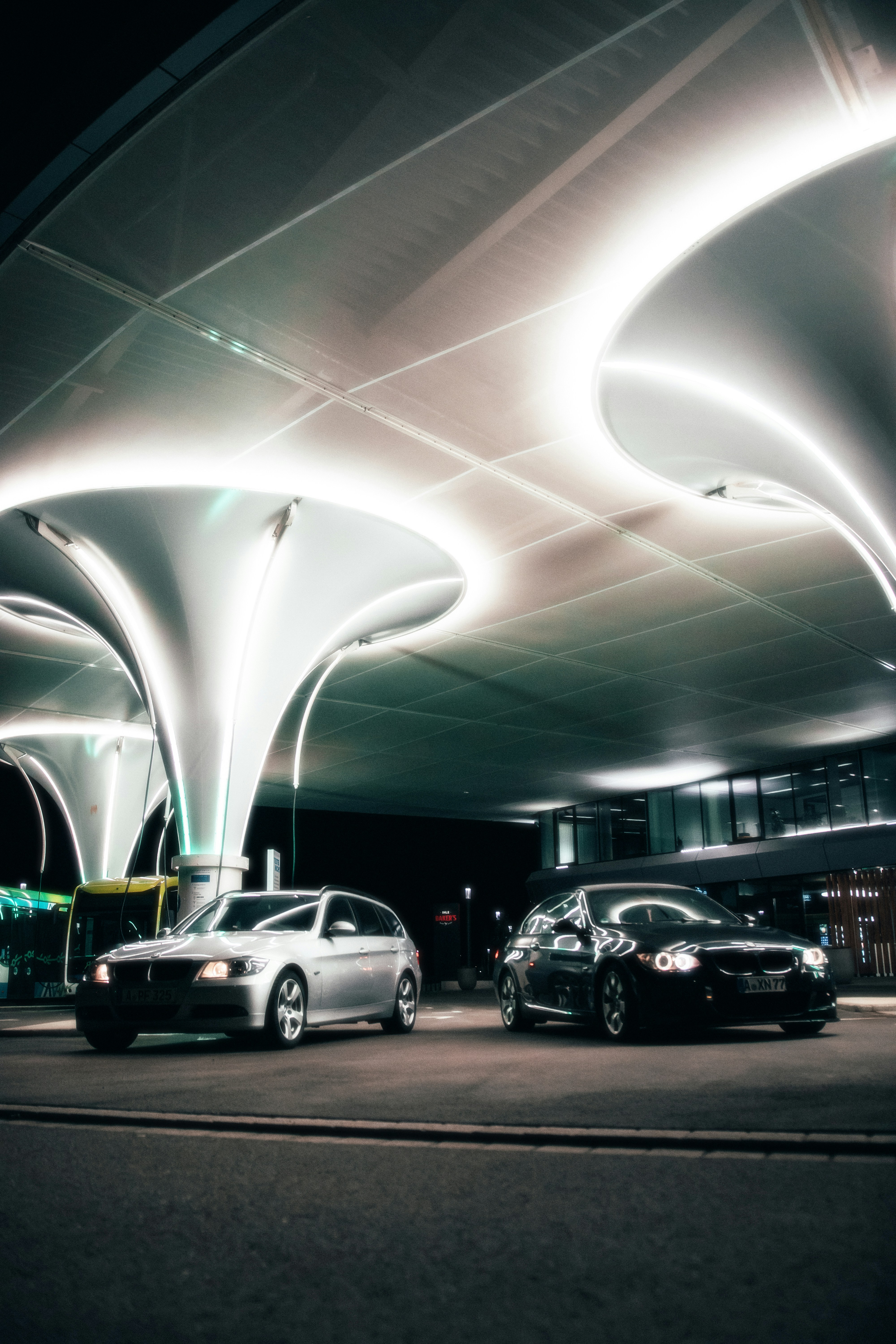 a group of cars parked in a parking garage