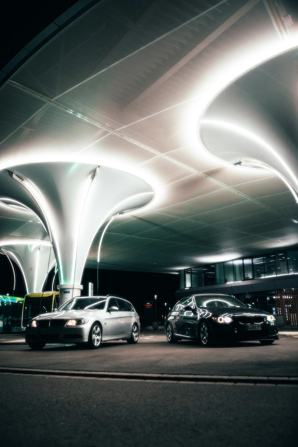 a group of cars parked in a parking garage