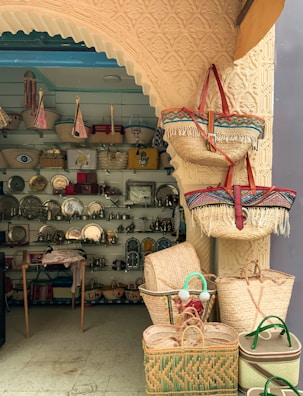 A cozy corner of the boutique showcasing woven bags and fabric accessories.