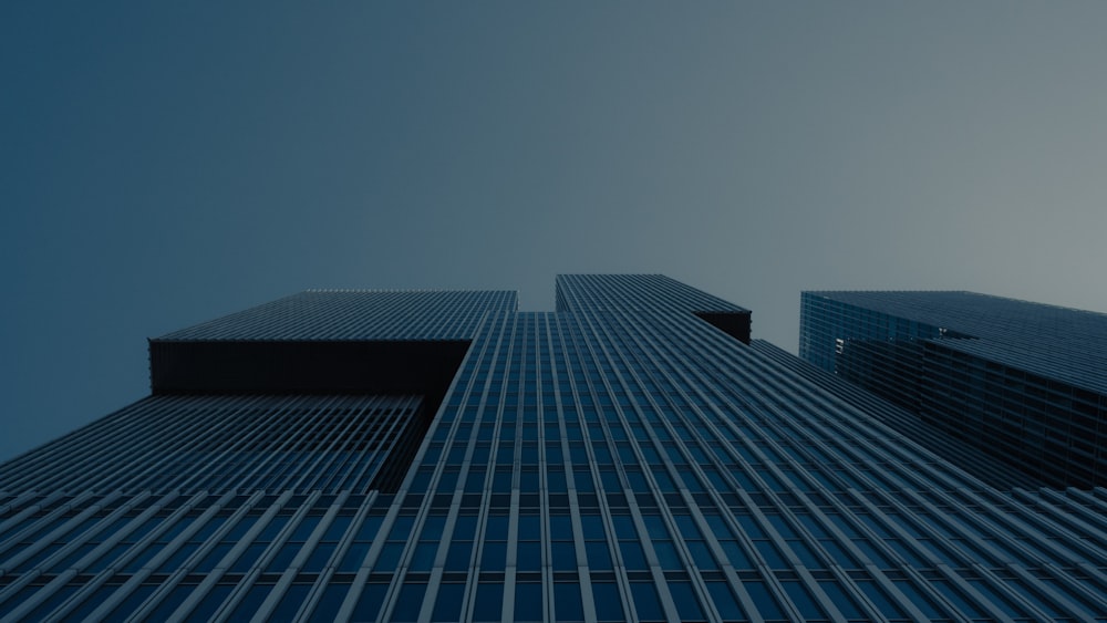 looking up at the top of a tall building