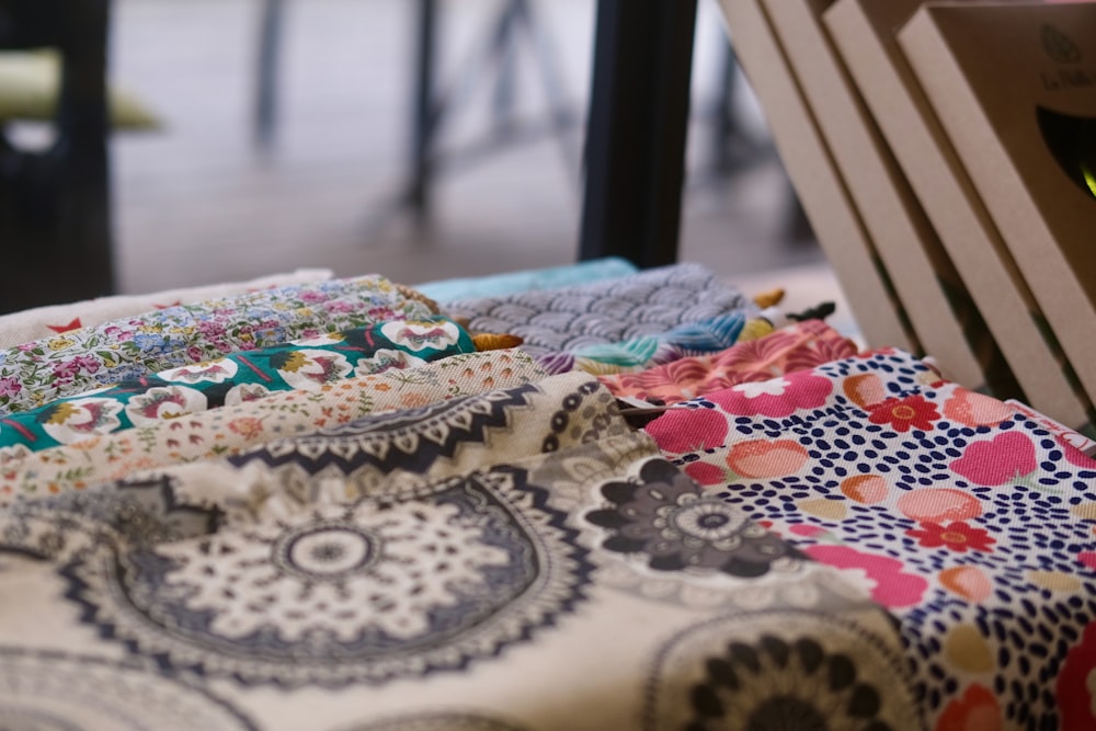 a close up of a pile of cloths on a table