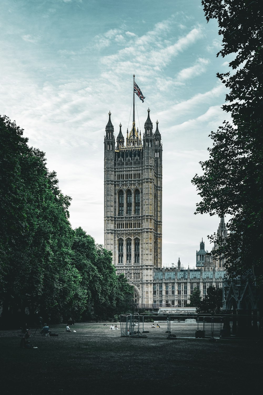 a tall tower with a flag on top of it